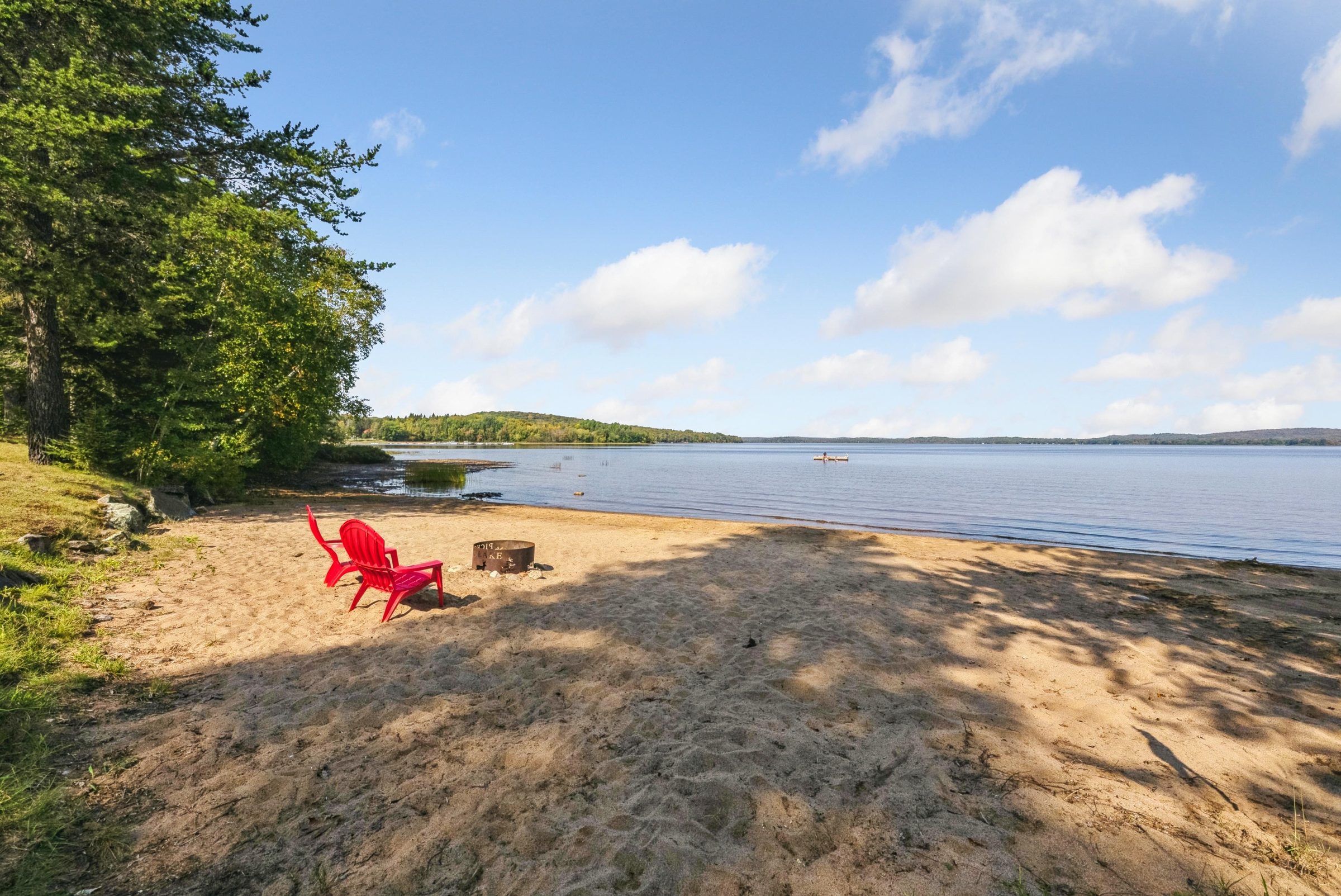 Private sandy beach and calm lake at SZNS